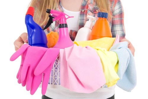 Carpet cleaner preparing safe equipment for a property cleaning job