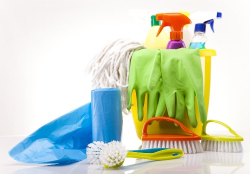 Croydon office cleaning service vacuuming carpets in a workspace